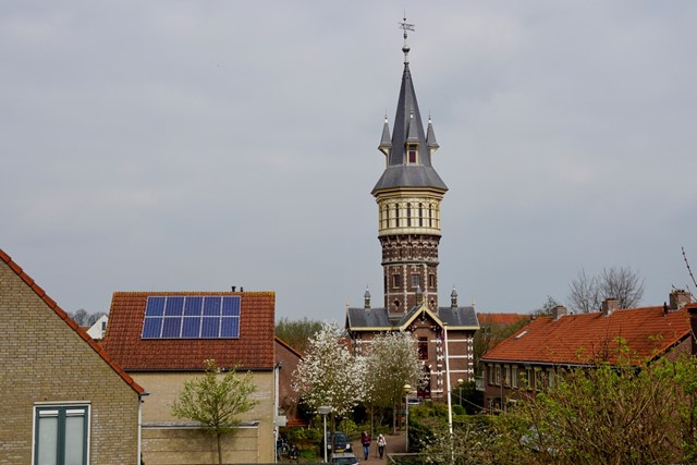 afbeelding van een watertoren met een spitse punt in Schoonhoven.