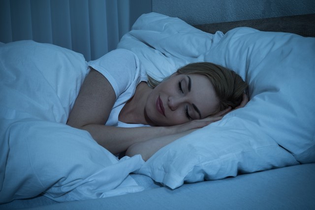 afbeelding van een slapende vrouw.
