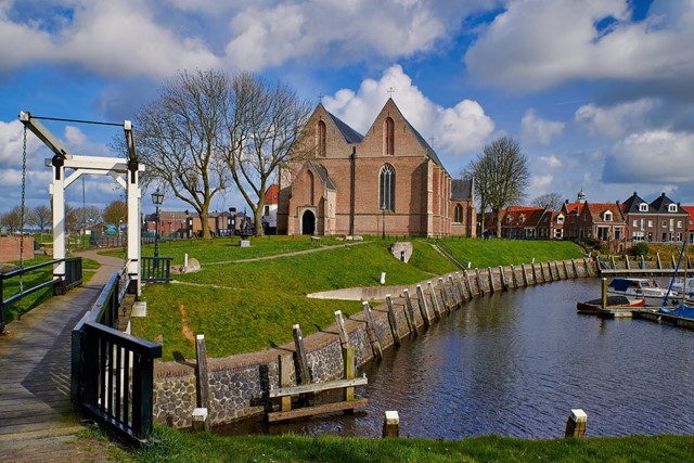 afbeelding van Vollenhove aan het water.