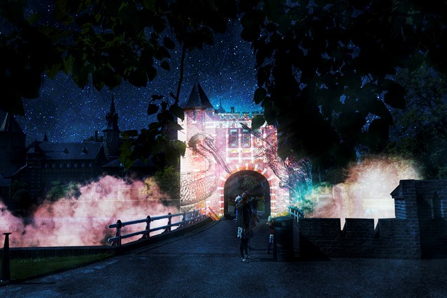 afbeelding van videomapping op een kasteel.