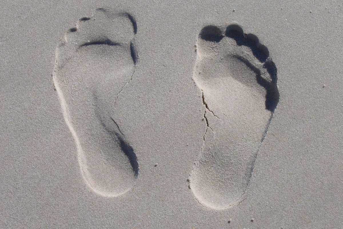 Voetafdruk in zand