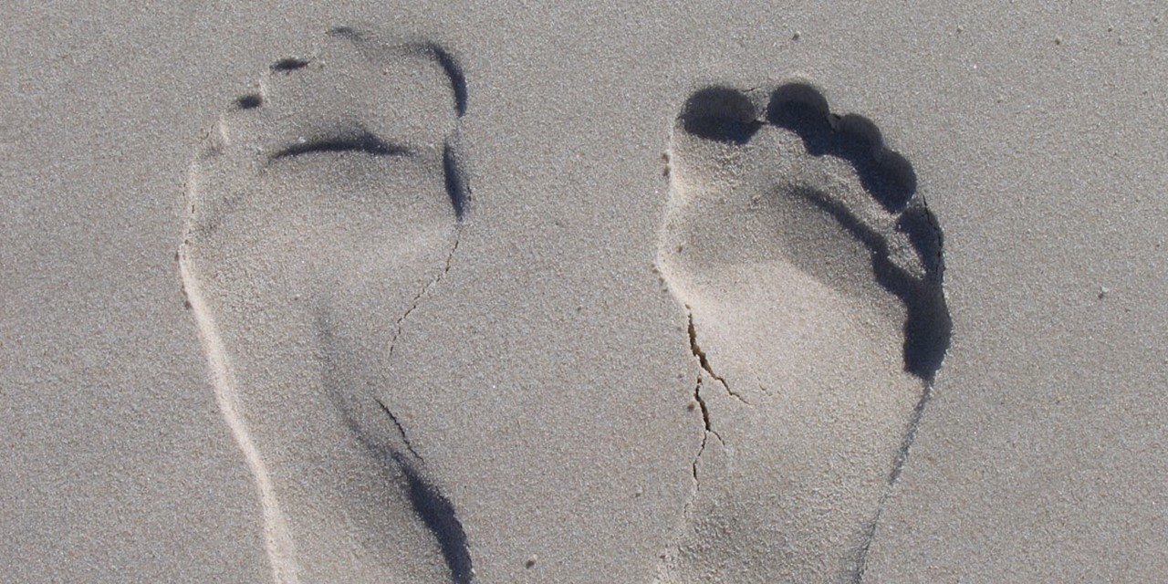 Voetafdruk in zand