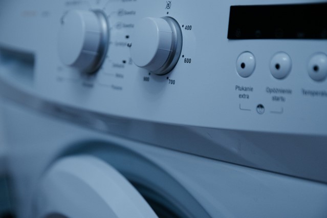Tips om je regenjas waterdicht te houden; Foto van een wasmachine