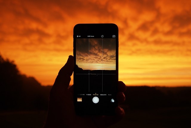 Foto maken van ondergaande zon